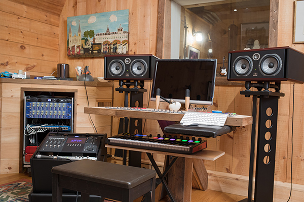 Keyboards and studio equipment and speakers set up in studio